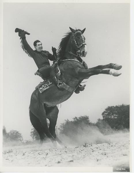 Original 8" X 10" Publicity Photograph Of Johnny Mack Brown On A Rearing Horse By Photographer Ray Jones JONES, RAY [PHOTOGRAPHER]
