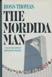 The Mordida Man. ROSS THOMAS